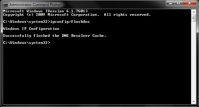 Windows command prompt window running ipconfig flushdns and netsh int ip reset commands